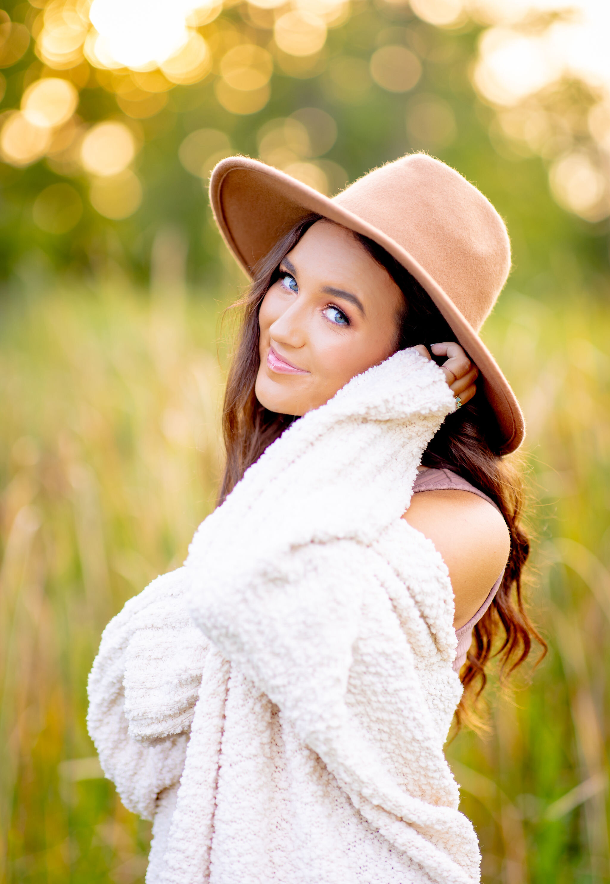 Senior portrait session with professional styling